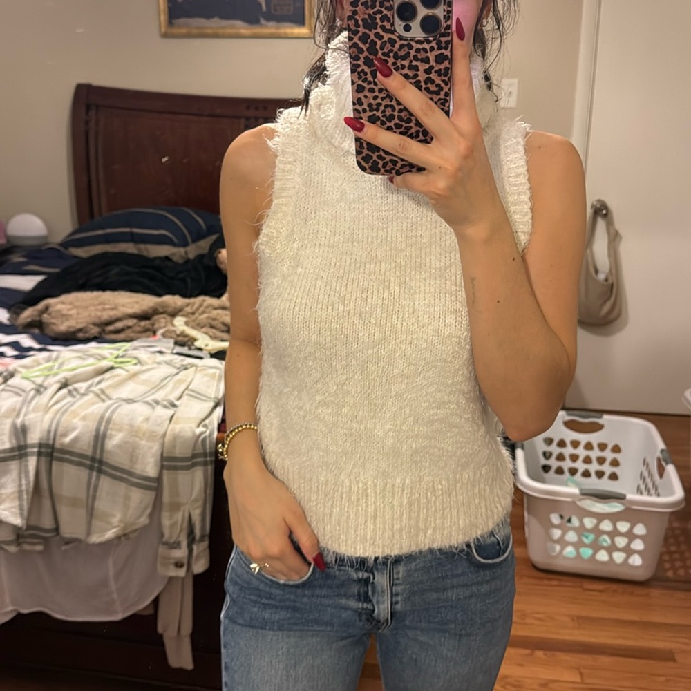 Fuzzy sleeveless turtle neck